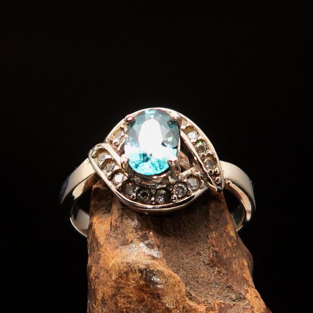 Sterling Silver Solitaire Ring with oval Cut Blue Zircon and 16 CZ - Size 6-3